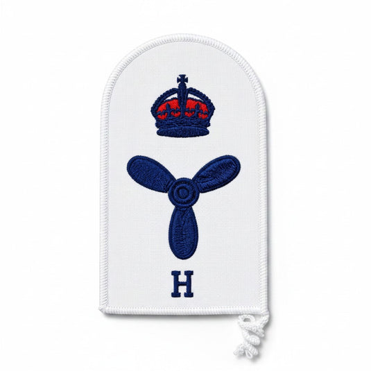 Cadetshop Marine Technical Hull category badge with embroidered crown, propeller, and H letter on white fabric
