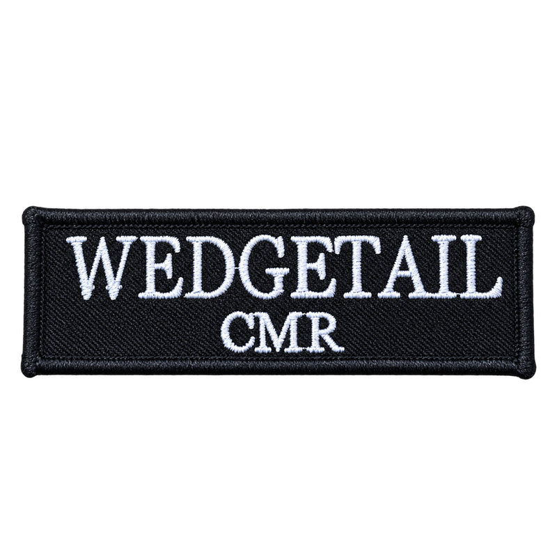Load image into Gallery viewer, Black embroidered patch with white stitched text reading ’wedgetail’ above ’cmr’
